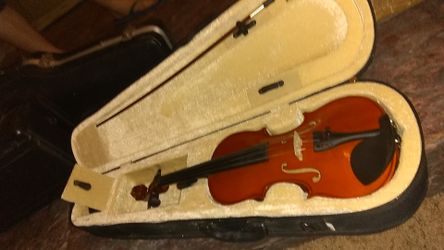 Half size violin with a canvas case