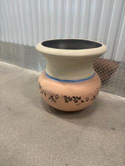 Large decorated ceramic planting pot. With hole in the bottom.  18 “ around by 18” high  $40