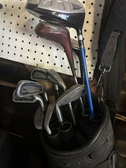 Golf Clubs And Golf Bag With Balls
