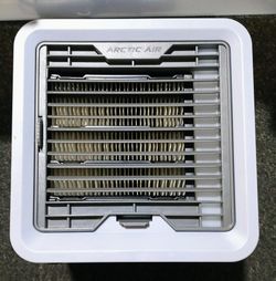 Small USB evaporative air cooler with light