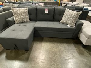 Photo Small Sectional Sofa with Pull Out Bed , Grey