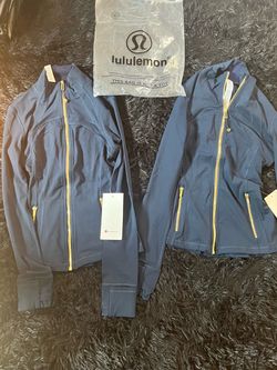 Black Zip-Up Jackets with Tags