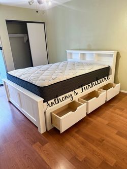 Queen bed with mattress and drawers