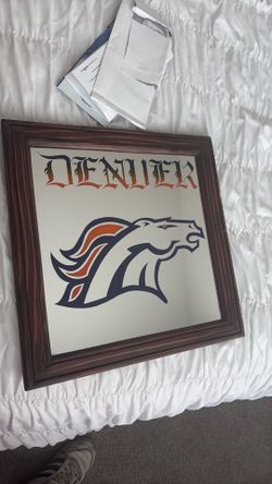 Vintage glass broncos sign