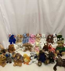 Lots of mint condition collecetable benaie babies