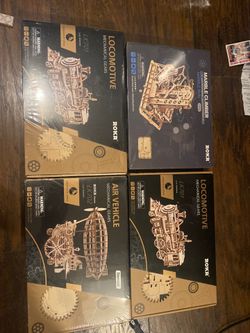 3D puzzles by ROKR still all sealed in plastic