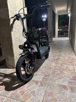 Black Electric Scooter with Cargo Basket