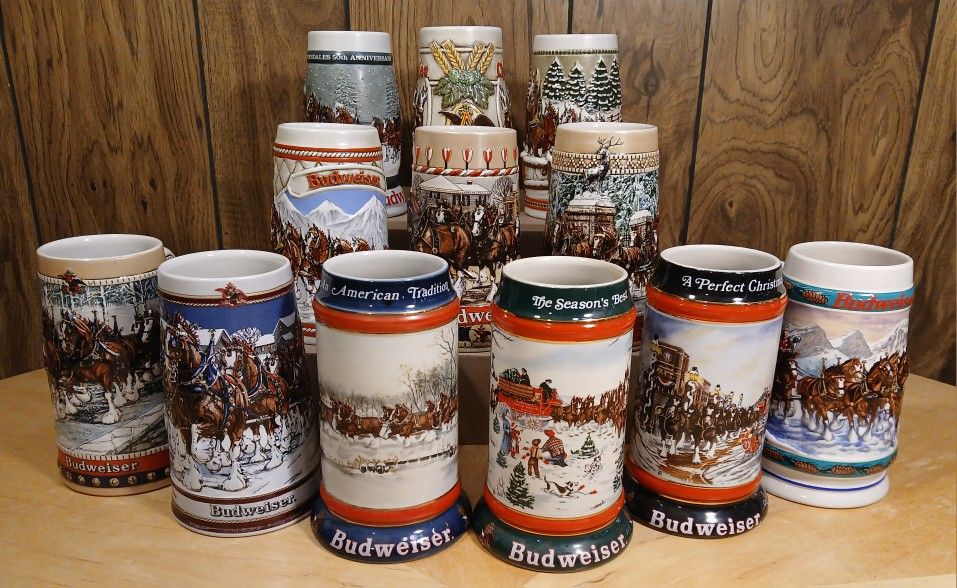 (12) Budweiser Holiday Collector Steins 1982-1993