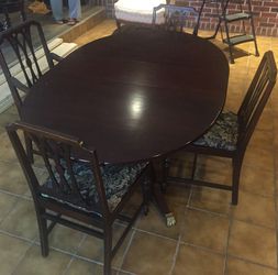 Antique dining table with 4 chairs