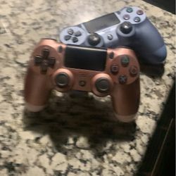 Two PS4 Controllers Gold And Blue