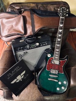 Trade for banjo. Keith Urban Electric guitar & Amp