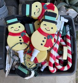 Bin full of Christmas lights and outdoor decor