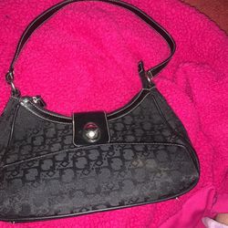 gently used black purse with a hide a way for your wallet