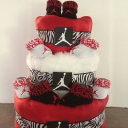 3 layer Jordan diaper cake with 4 pair of Jordan booties. Many styles and colors are available