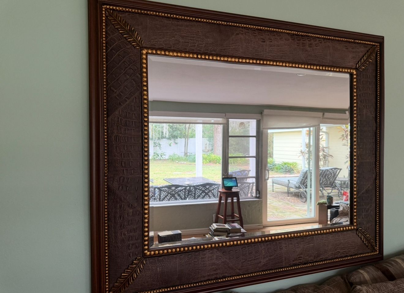 Wall mirror-Deep, textured faux-alligator surround with gold accents. 56x45