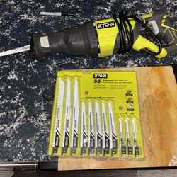 New condition RYOBI 12 Amp Corded Reciprocating Saw & blade pkg