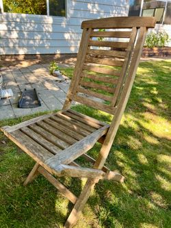 Teak folding outdoor chairs. (Two )