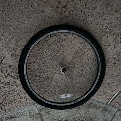 One Schwinn Bike Rim With Tube And Grips