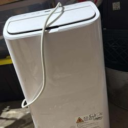 GE PORTABLE AIR CONDITIONER