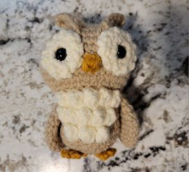 Hand crocheted owl.  I can make in whatever color you prefer. 
