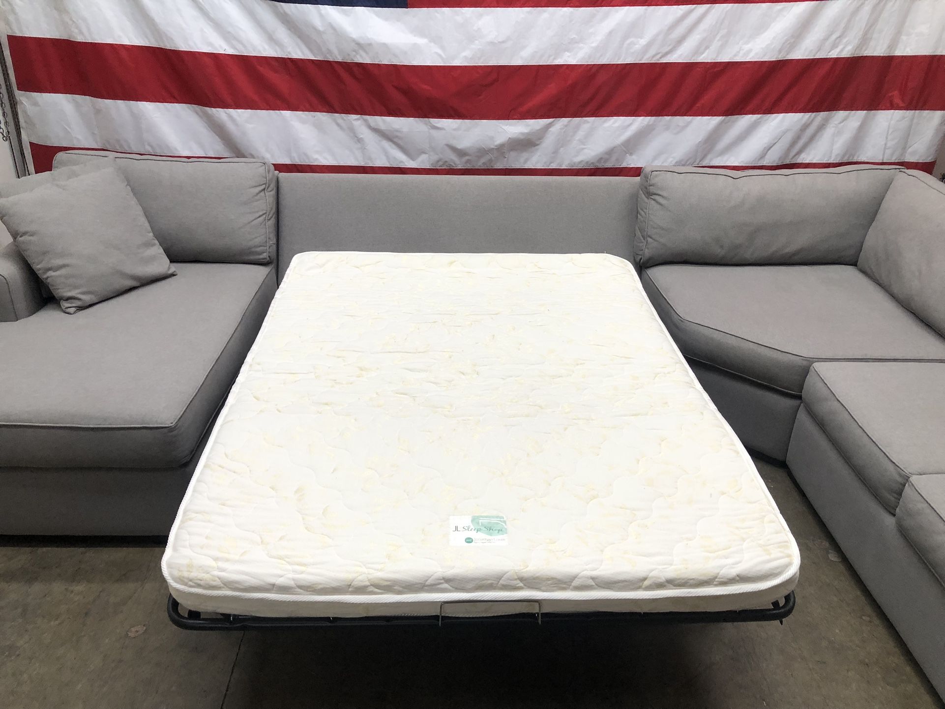 Free Delivery - Living Spaces Sectional Sleeper Couch