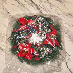 Christmas Wreath with Poinsettias and Berries