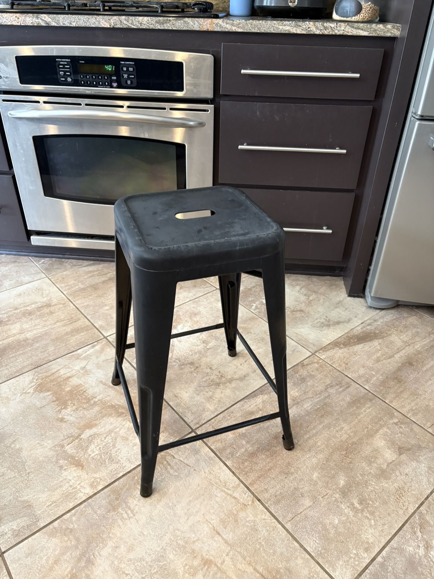 ONE metal black stool. 23.5” tall