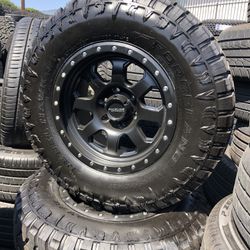 17 INCH WHEELS AND TIRES. 285/70/17