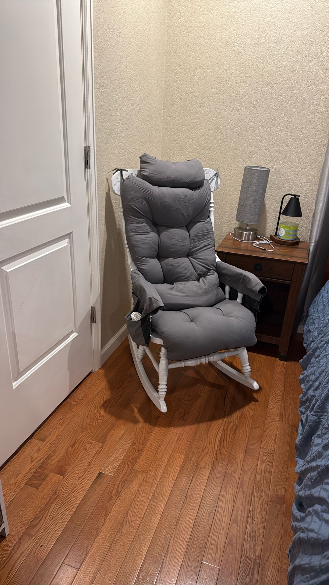 Rocking chair With Gray Cushion.