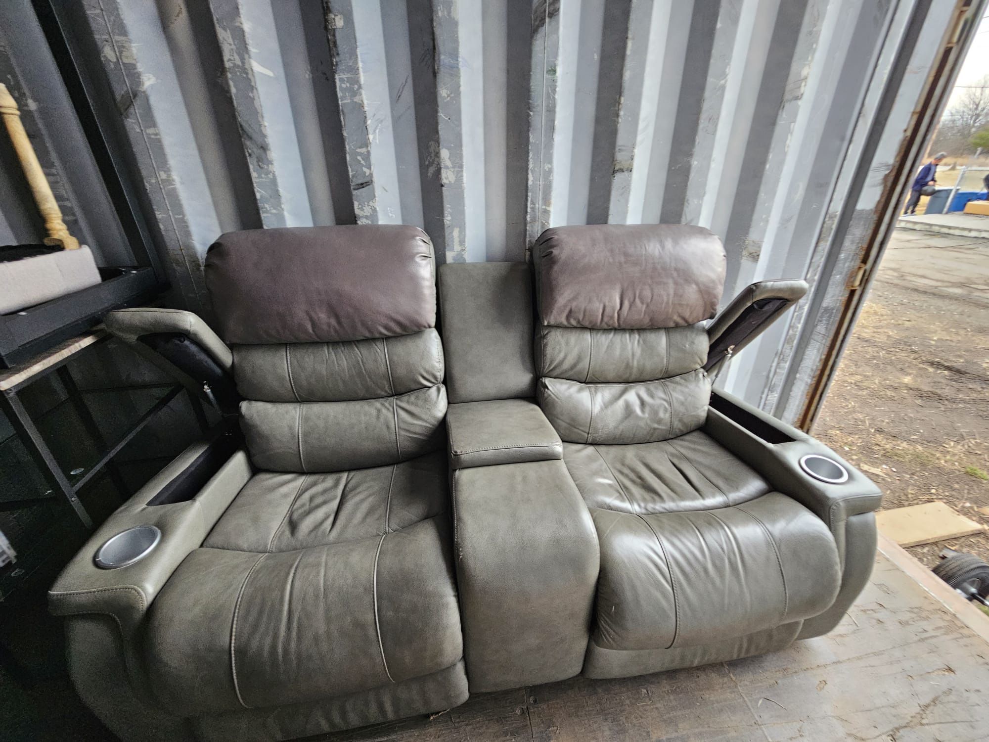 Dwyer Double Reclining Sofa with Center Drop Down Cup Holders