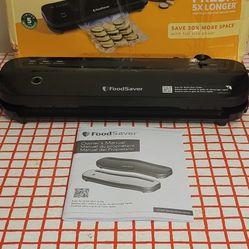 FOOD SAVER SPACE SAVING MODEL 1210. $55.00