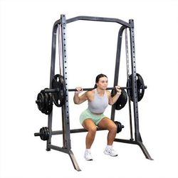 Body Solid Squat Rack w/500+ pounds of 45 plates