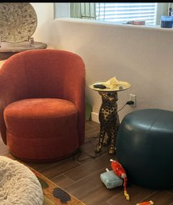 Orange swivel chair