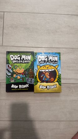 Two brand new dog man books