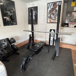 Rouge Monster Light Rack, Bar, Weights , Bench , Safety Spotter Arms,  And Flooring 