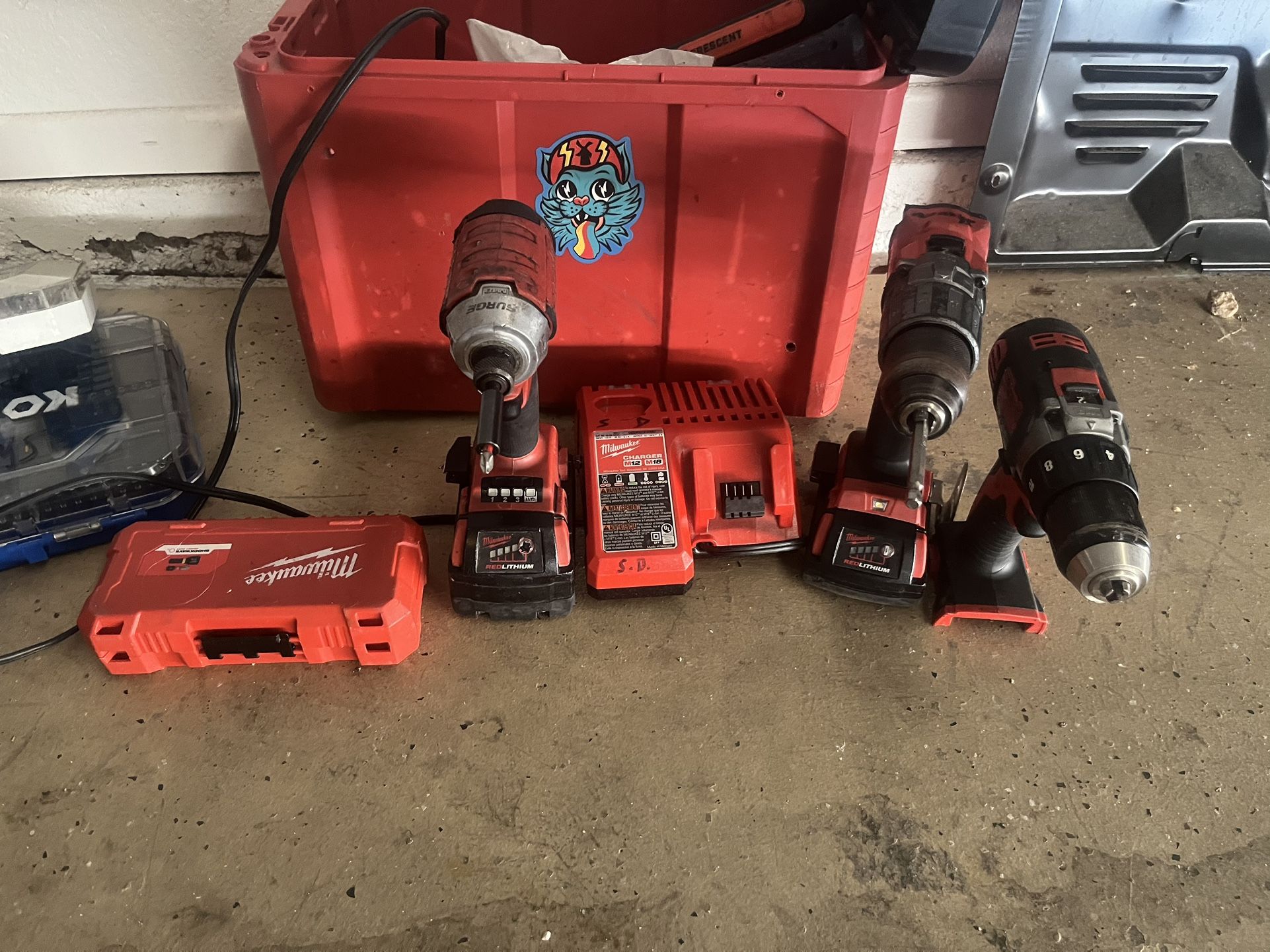 Milwaukee Impact And Two Drills Two Batteries, And A Charger