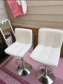 2 white bar stools