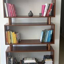Beautiful solid wood console table with a unique curved design.  Very sturdy and in great condition — perfect for entryway or living space.  Selling b