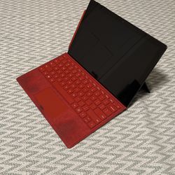 Surface Pro 7 Matte Black With Red Type Cover
