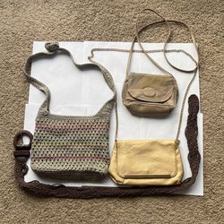 lot of 3 women's bags and a belt.