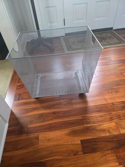 Metal wire with wheels laundry basket.