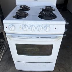 White 24” Electric Stove And Oven