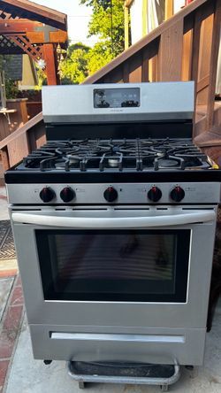 Microwave and Frigidaire Stove