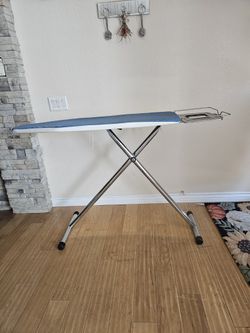Ironing Board -Commercial Grade Ironing Board. Adjustable Height.  Comes With Blue Cover. Iron Stand Attached. 47.5" Long & 18" Wide.