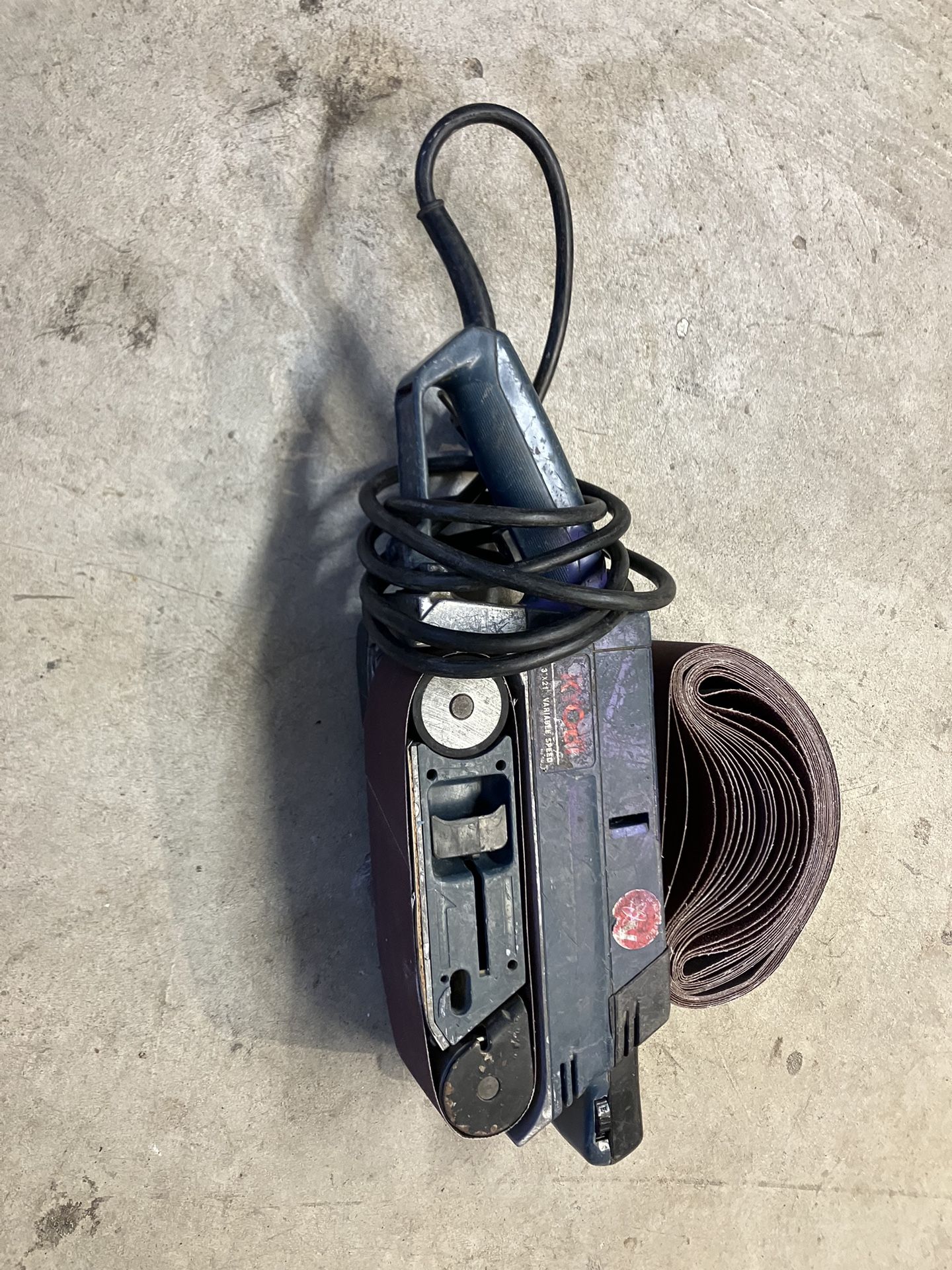 Ryobi Variable Speed Belt Sander with New Package of Sanding Belts.