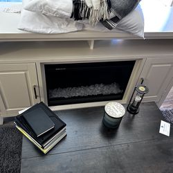 Couch coffee table and fireplace stand all new