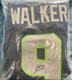 Ken Walker signed XL blue Seattle Seahawk jersey