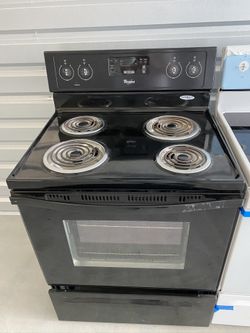 Whirlpool black coil top stove brand new with warranty