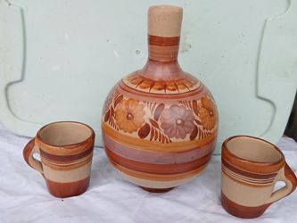 Vintage handmade burnished. Pottery water bottle and cups