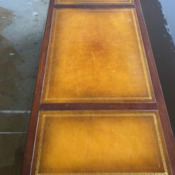 1940’s Gold Embossed Leather To Table With Original Caster Wheels